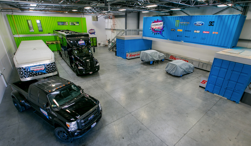Illustration for article titled Ken Block's New Headquarters Is A Garage Mahal Made Of Shipping Containers And Hoonage